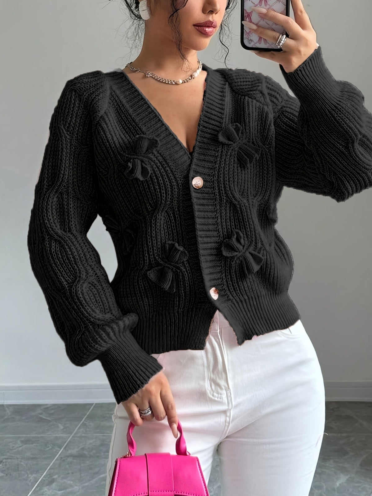 Feminine Cable-Knit Cardigan with Bow Details