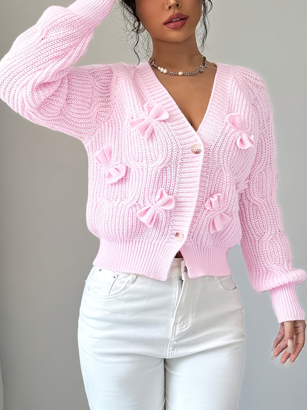 Feminine Cable-Knit Cardigan with Bow Details