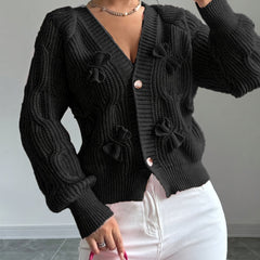 Feminine Cable-Knit Cardigan with Bow Details in Black