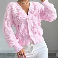Feminine Cable-Knit Cardigan with Bow Details in Pink
