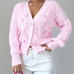 Feminine Cable-Knit Cardigan with Bow Details