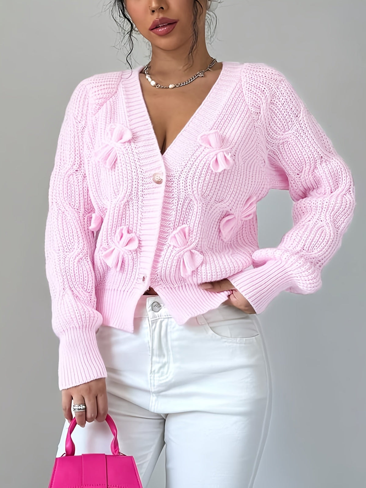 Feminine Cable-Knit Cardigan with Bow Details